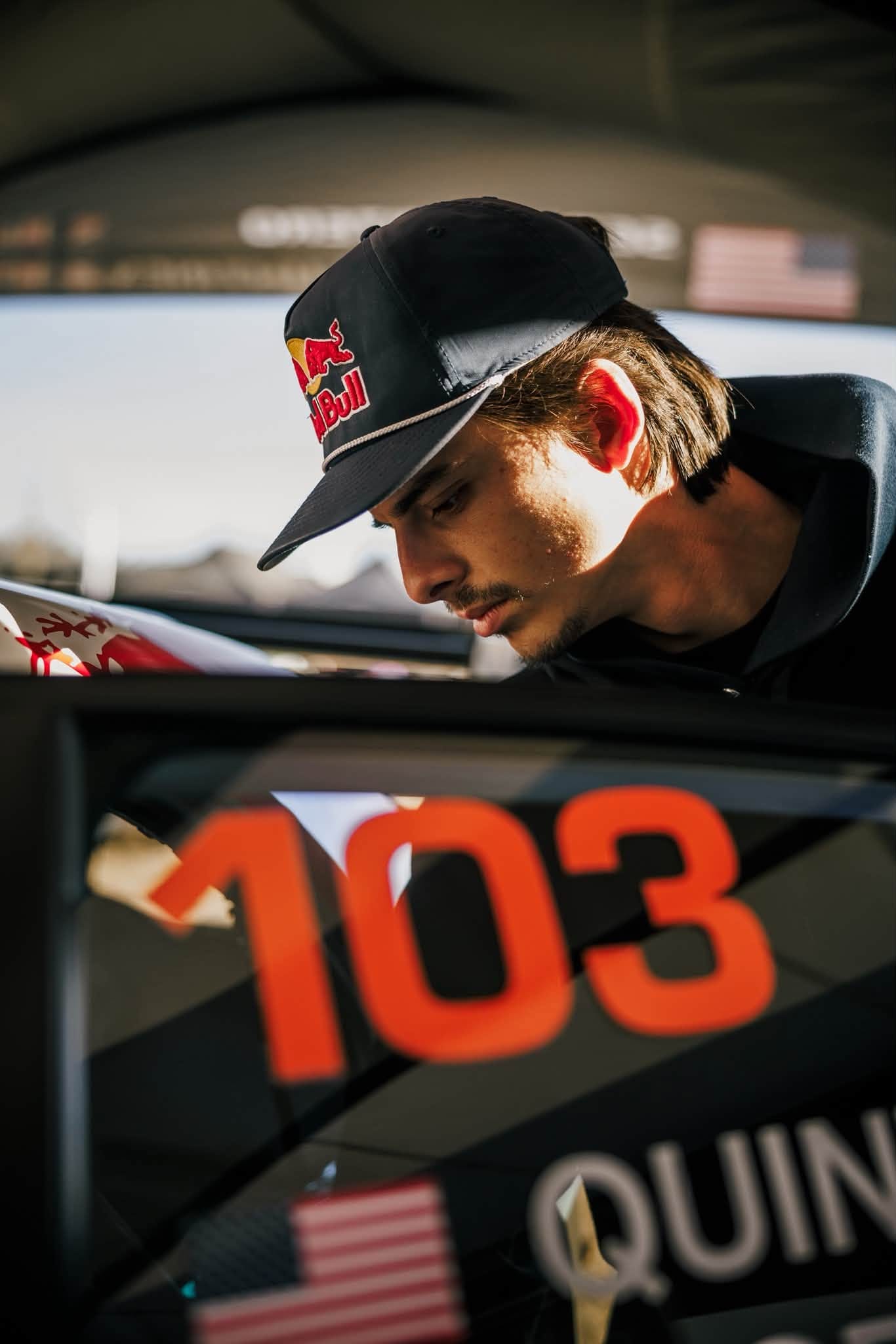 Seth Quintero beside his No. 103 Toyota rally car