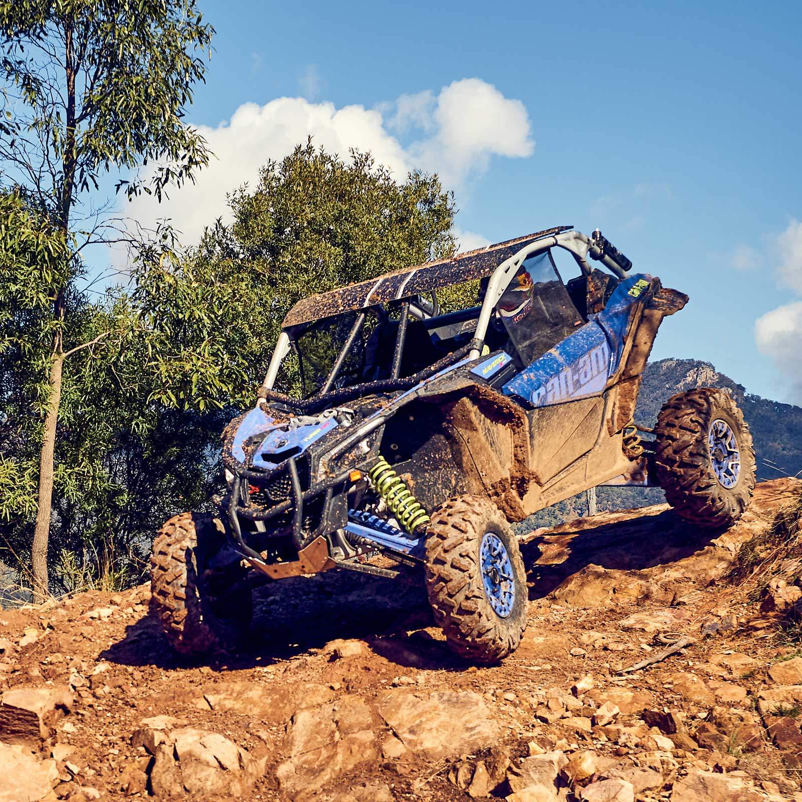 Can-Am Maverick X3 climbing a rocky hill