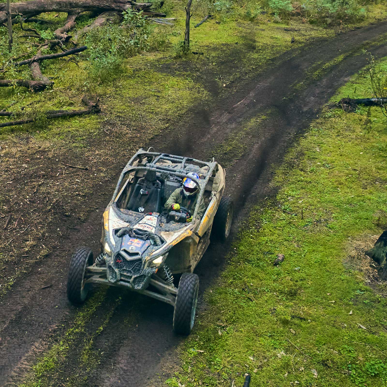 Aerial view of a Can-Am Maverick X3 on a grassy trail