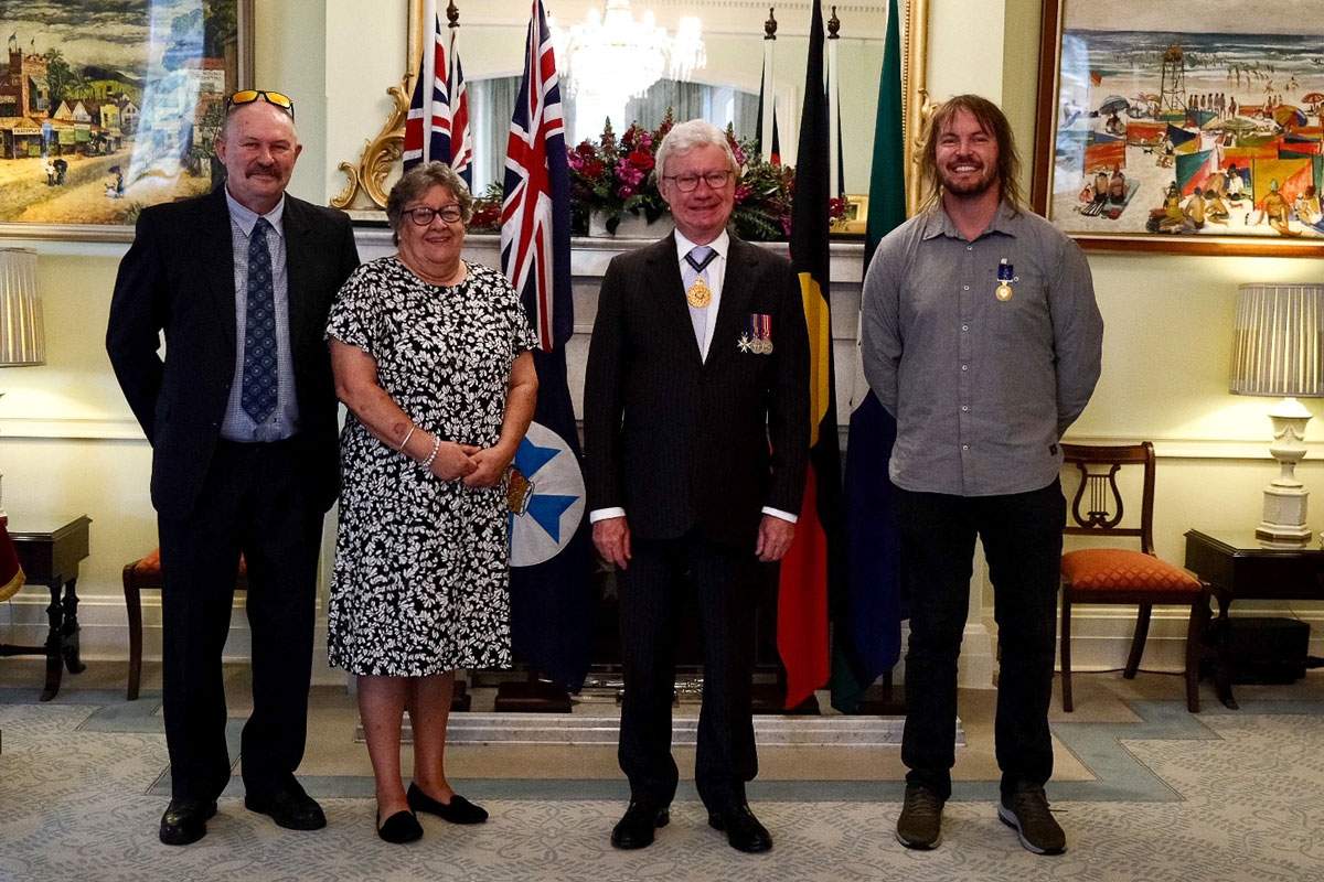 Toby Price with family and the Governor of Queensland after receiving his Medal of the Order of Australia