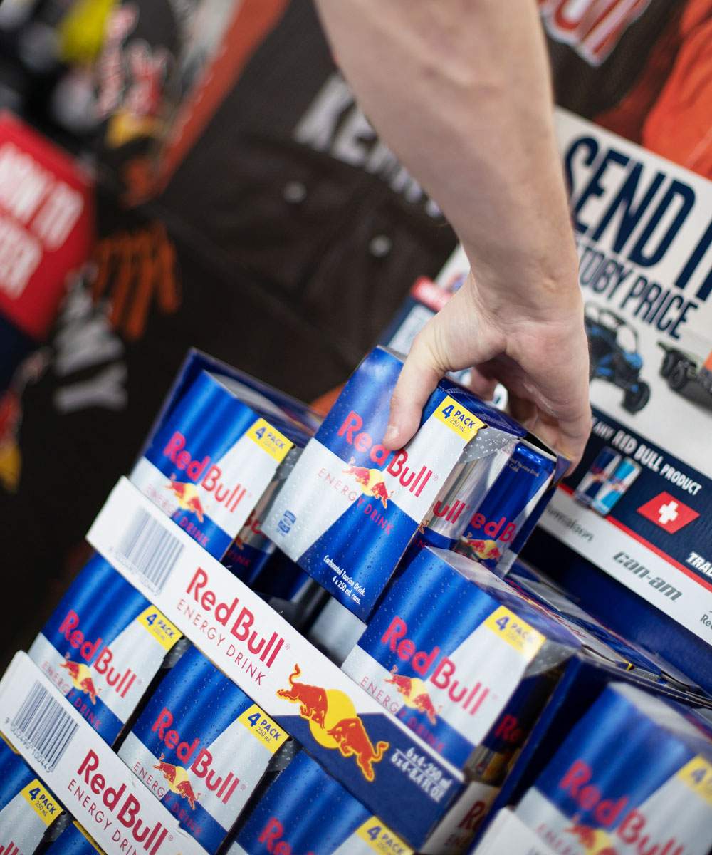 Red Bull cans stacked on the Send It with Toby Price display