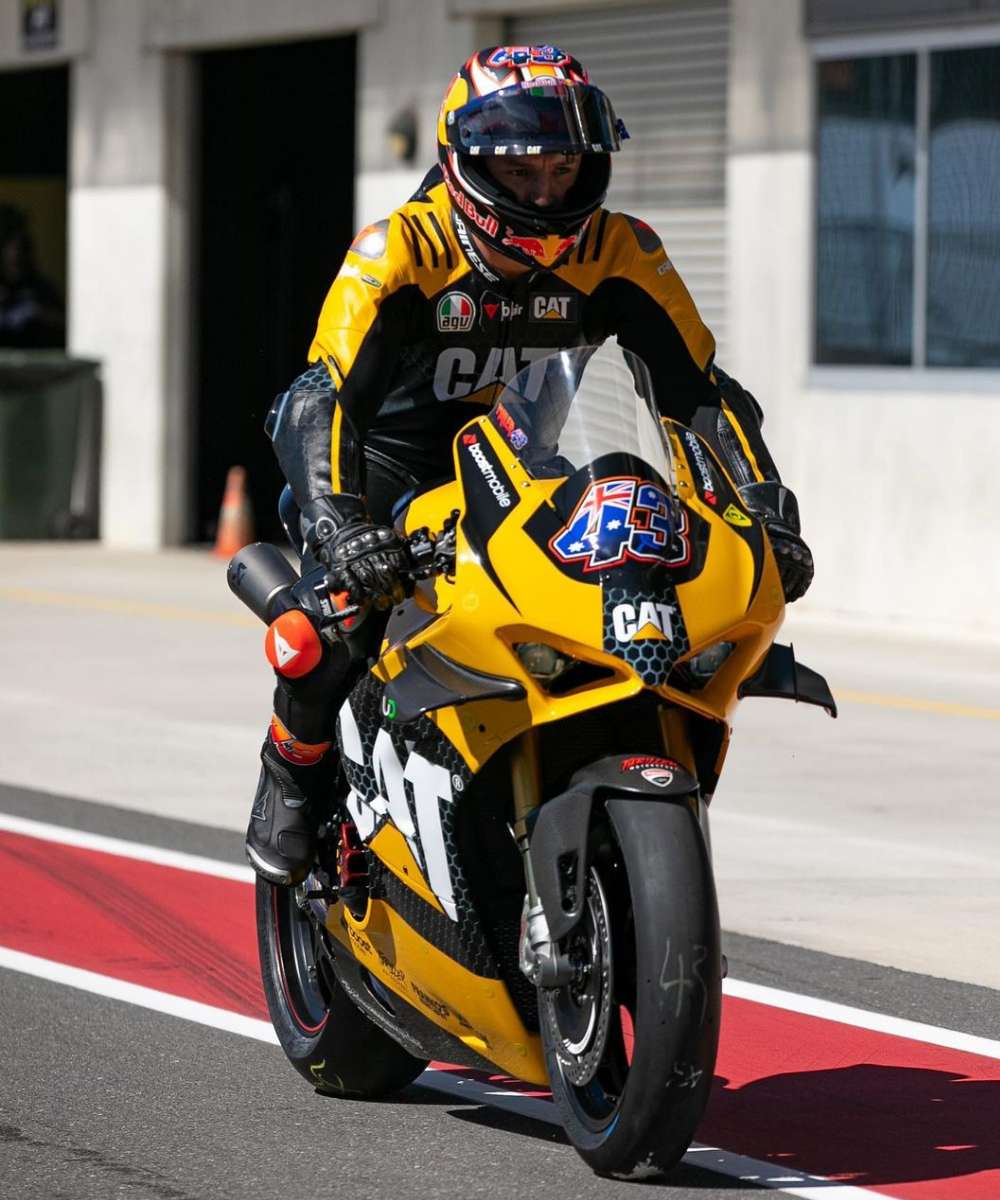 Jack Miller heading out on track for the first time on his Cat-liveried motorcycle