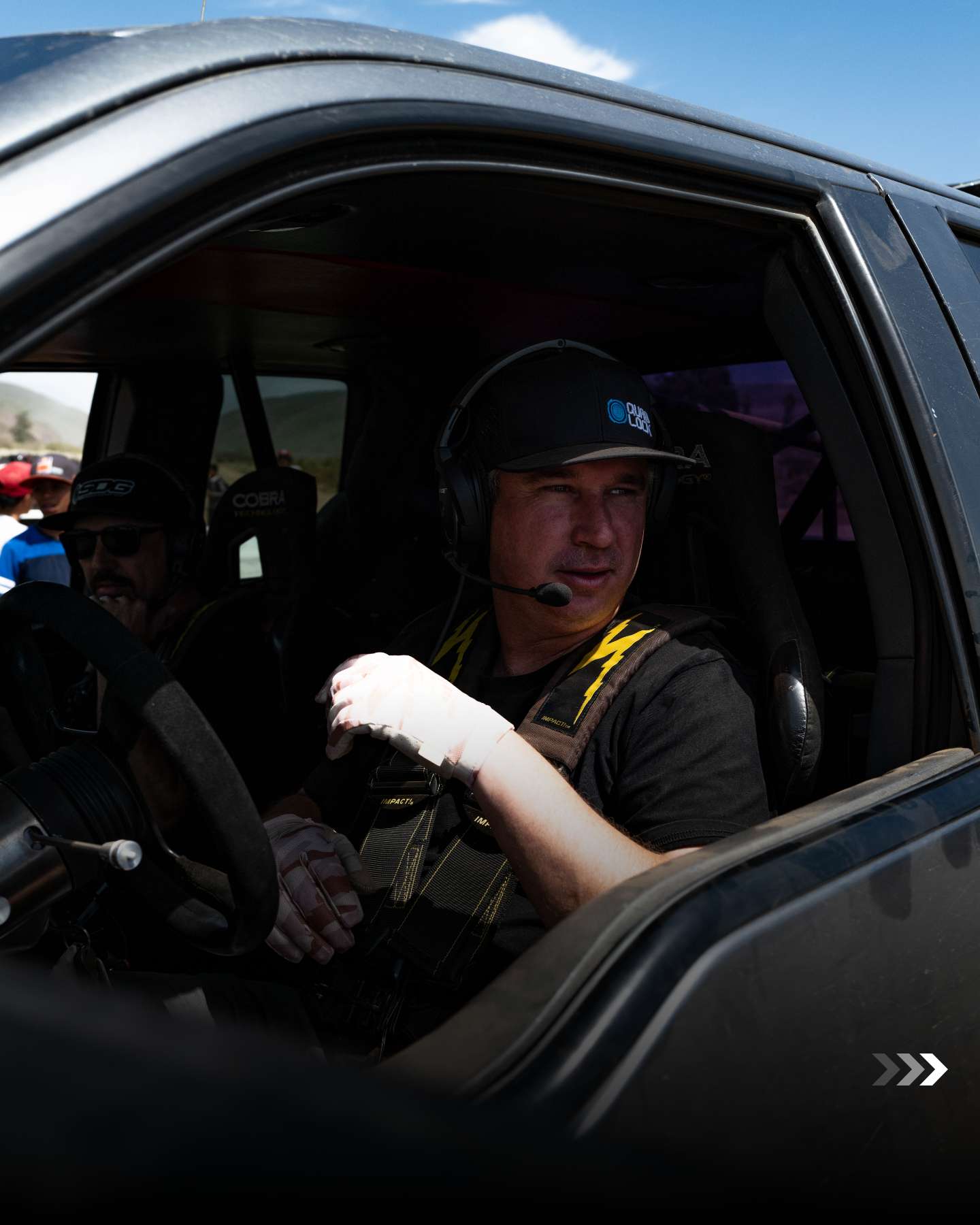 Toby Price strapped into the Team Australia Trophy Truck