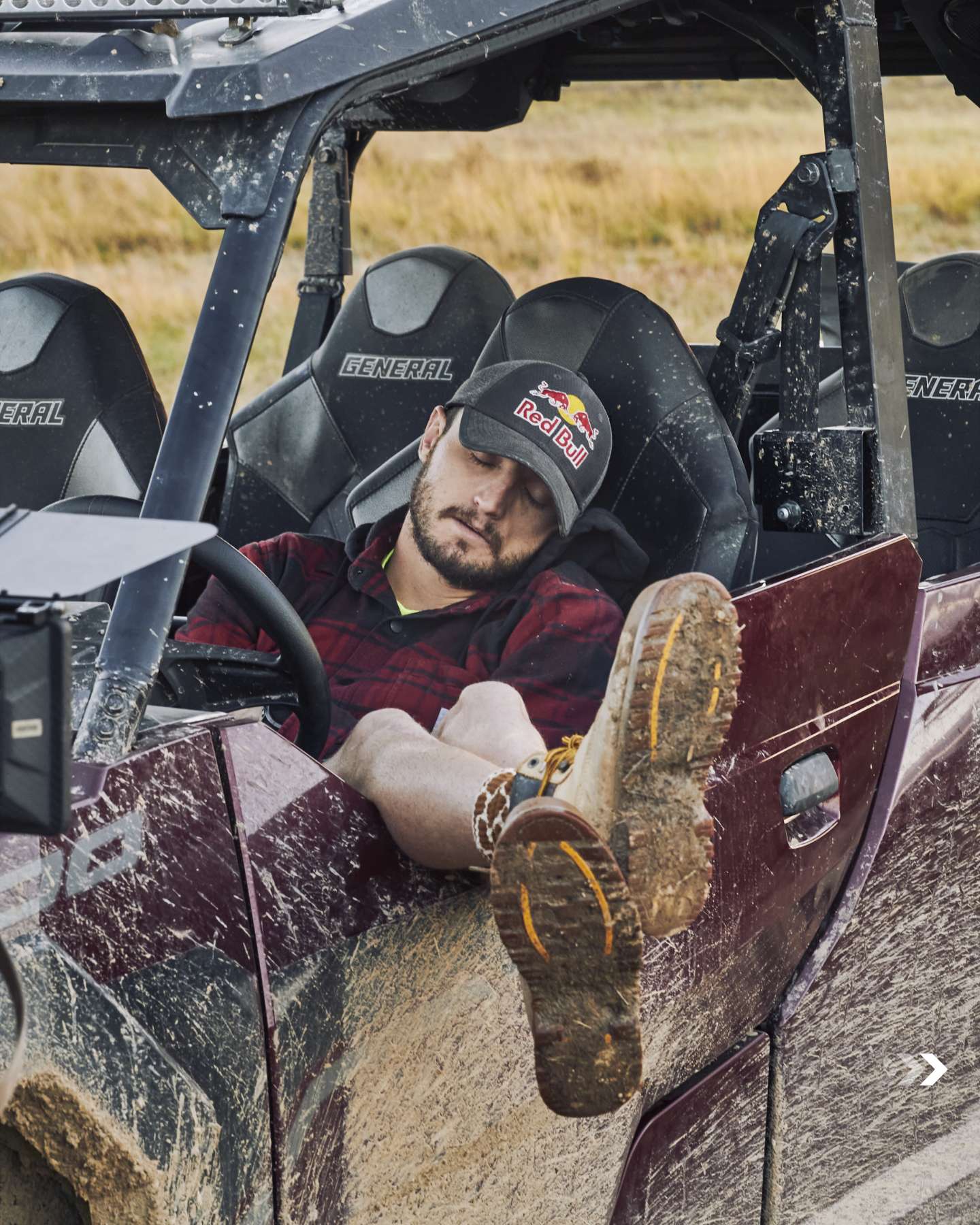 Jack Miller relaxing in a side-by-side on the farm