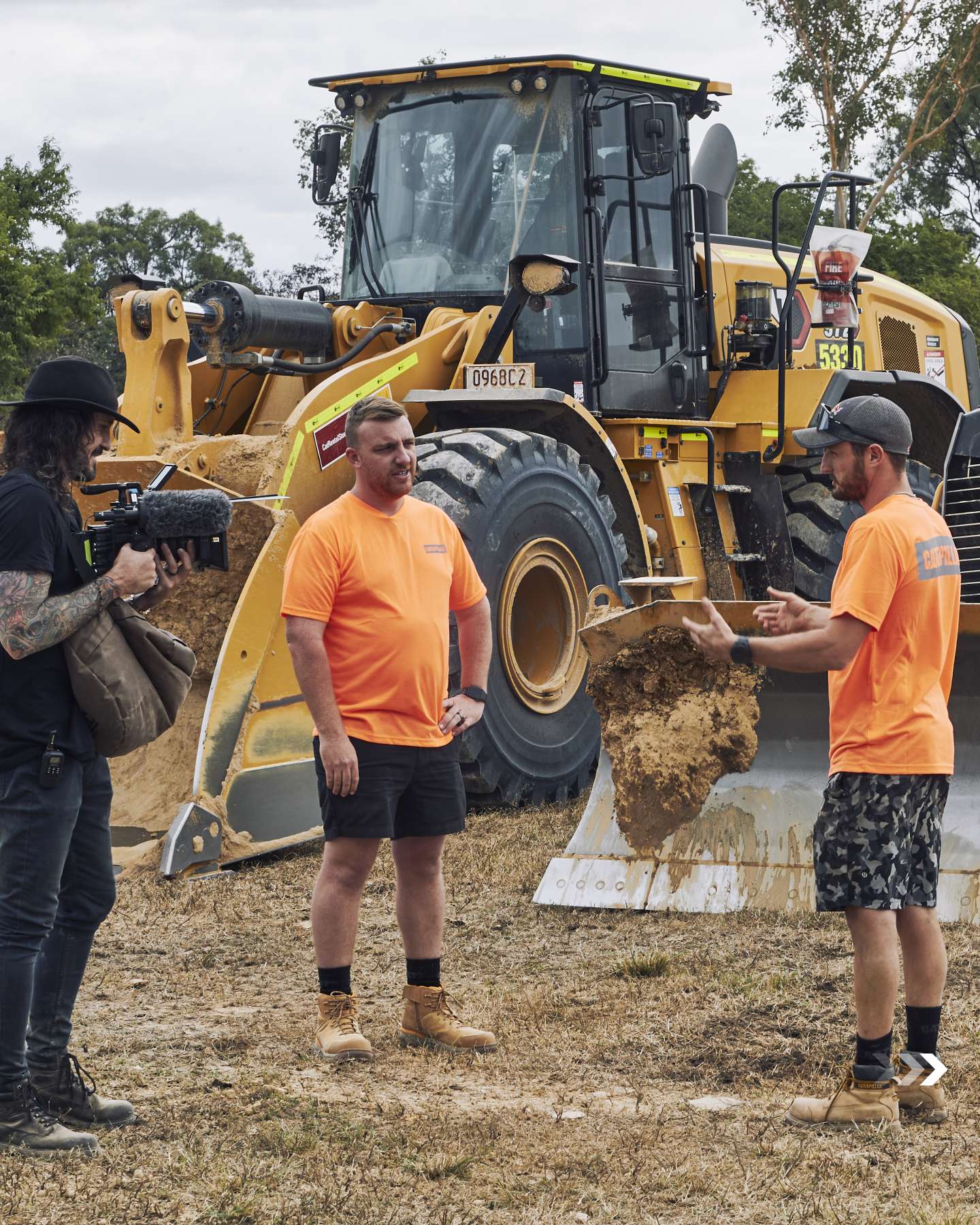 Behind the scenes with the crew and a Cat wheel loader