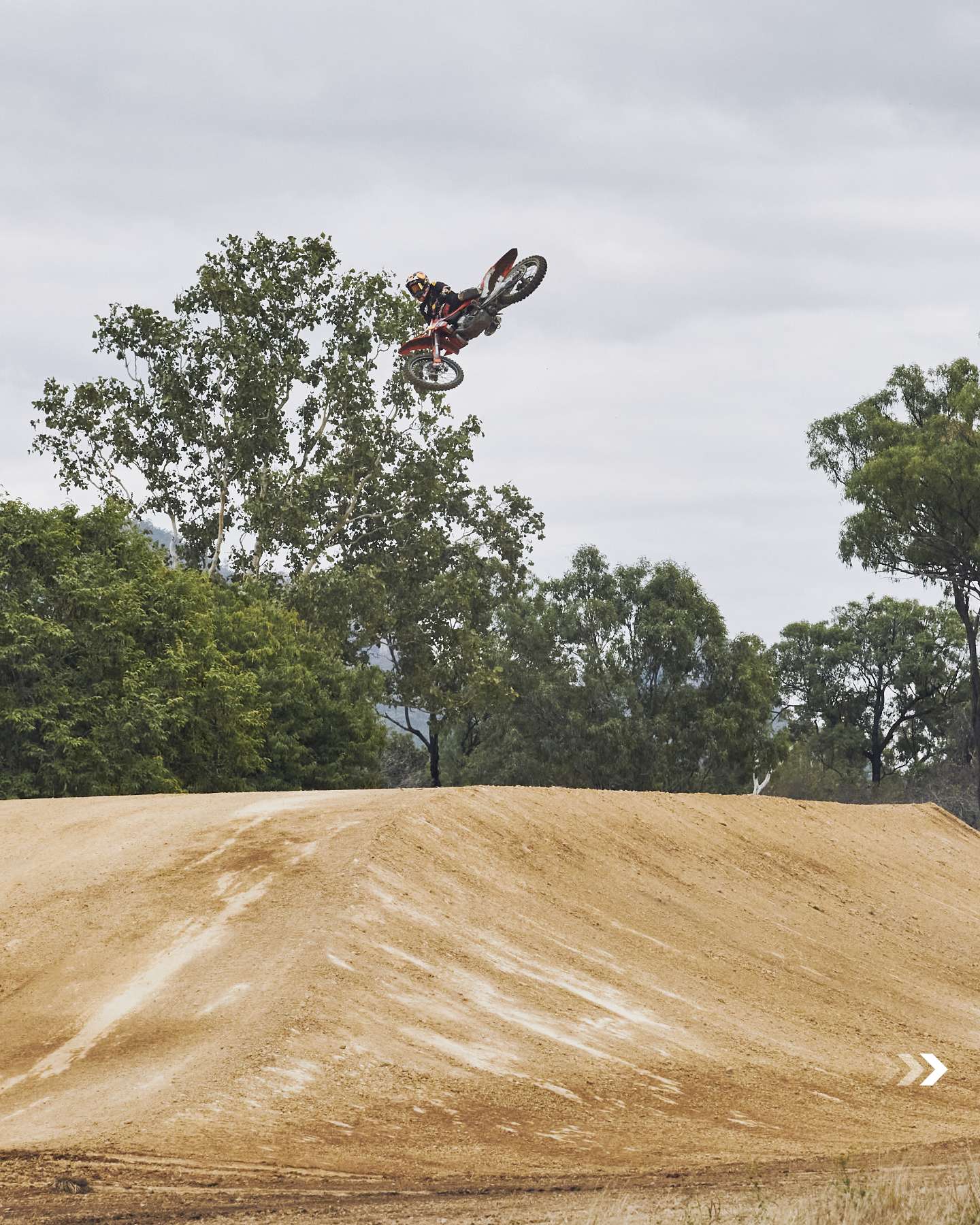 Jack Miller jumping over the trees at the Dream Build track