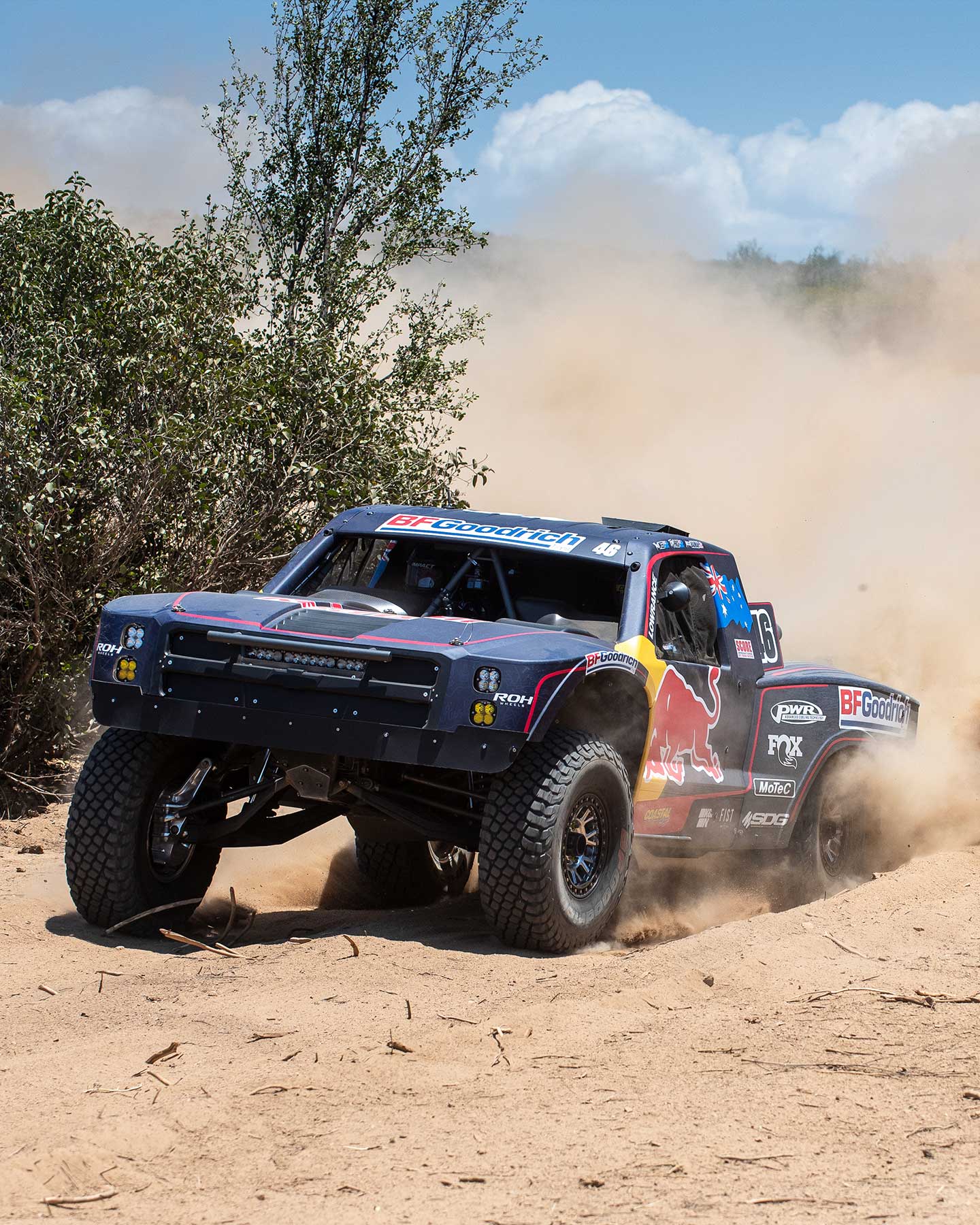 Team Australia’s Trophy Truck jumping past spectators in Baja, Mexico