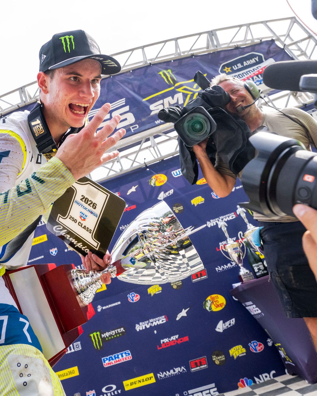 Cole Davies on the podium with the 2026 AMA Pro Motocross 250 Championship trophy